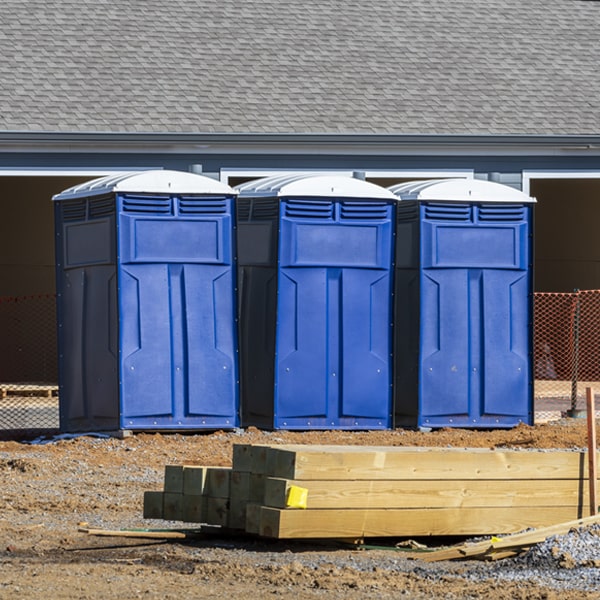 what is the cost difference between standard and deluxe porta potty rentals in Everly